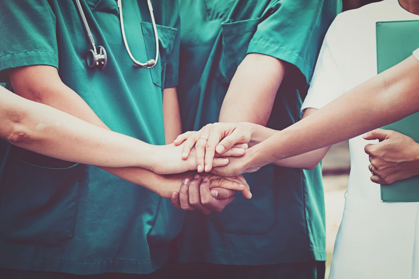 EC - Images - Medical Staff in a Hand Huddle